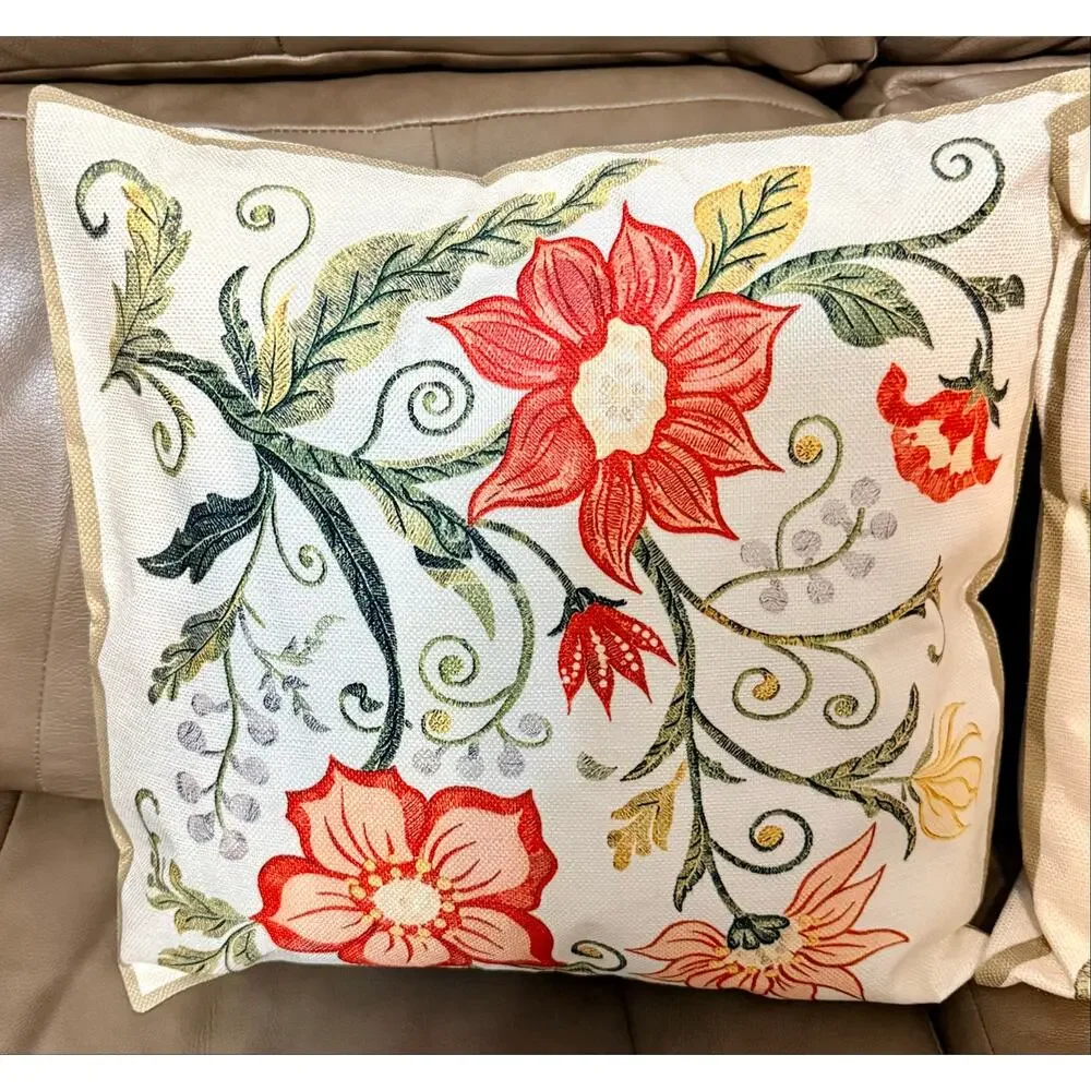 Two throw pillows featuring embroidered look floral pattern NEW